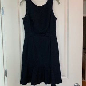 Above-the-knee black A-line dress w/ flare skirt